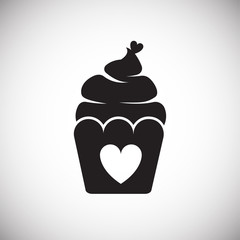 Cupcake with heart on white background icon