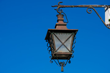 Fototapeta na wymiar Old street lamp in Obidos, Portugal