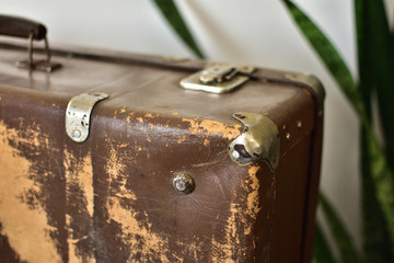 vintage brown shabby suitcase close-up