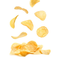 Tasty crispy potato chips on white background