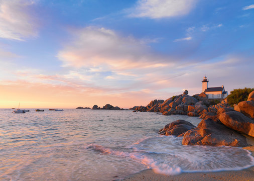 France, Brittany, Finistere, Brignogan Plages, Pontusval Lighthouse on Pointe de Beg Pol at sunset