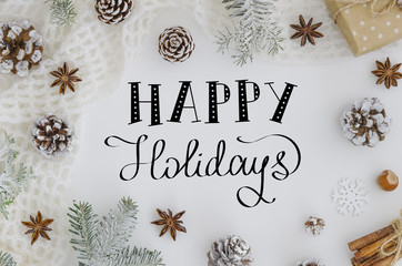 Fototapeta na wymiar hand lettering greeting card Happy Holidays On white Background. Christmas Greeting Card. Christmas Decoration, Christmas Tree, Snowflakes,Golden Christmas Ball
