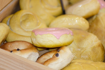 sweet donuts with pink frosting