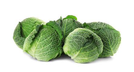 Fresh green savoy cabbages on white background