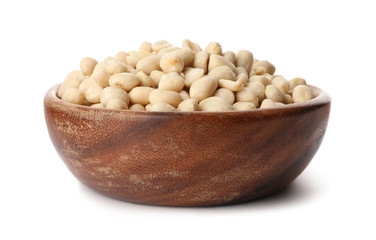 Shelled peanuts in bowl on white background