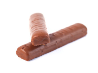 chocolate sticks with caramel on a white background