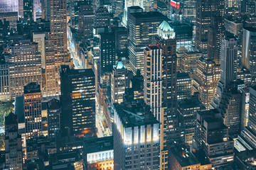 Fototapeta premium New York City at night, view from the Empire State Building, color toned picture, USA.
