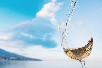 White wine splash isolated on background
