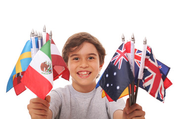 Happy kid holding a bunch of world flags