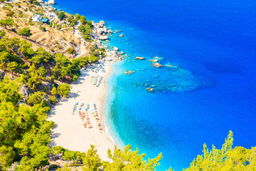 Fototapeta na wymiar Amazing aerial view of Apella beach on sea coast of Karpathos island, Greece