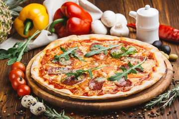 Pizza with meat and cheese