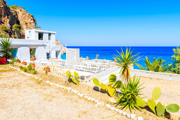 Taverna buildings on Kyra Pynagia beach, Karpathos island, Greece