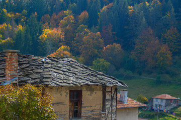 Autumn landscape with an old house from the village of Fotinovo, Bulgaria.