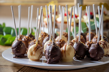 cake pops with different chocolates and decorations