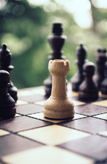 Rook chess figure on a playing board