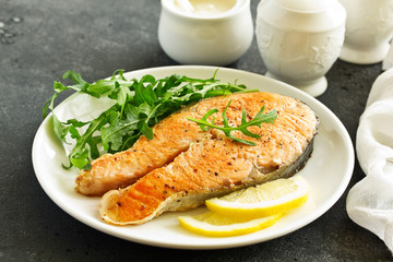 grilled salmon steak with cream sauce.