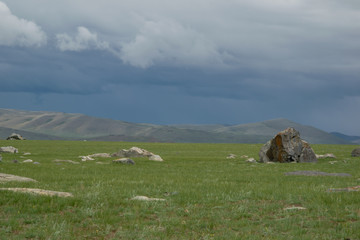 Large single stones on the plain. Russia, Republic of Altai Chuya. Desert land