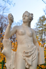 Fototapeta na wymiar Statue of allegory of truth in Summer Garden.