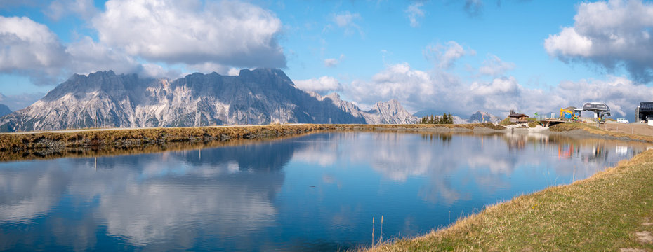 Image of mountain panorama with water reflections in lake