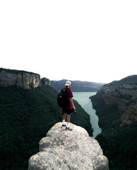 young man on top of the mountain