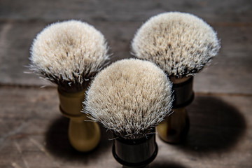three shaving brushes