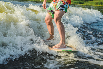 Fototapeta premium surfer rides on the board