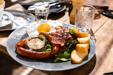 Plate with unhealthy food is on the table