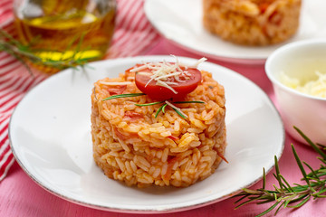 Tasty tomato rice with cheese and tomato sauce