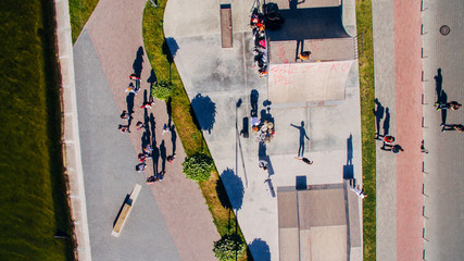 Young people dancing, singing and playing sports on the city s waterfront. Ternopil, Ukraine. View from above, aerial shooting from drone. Surrealism