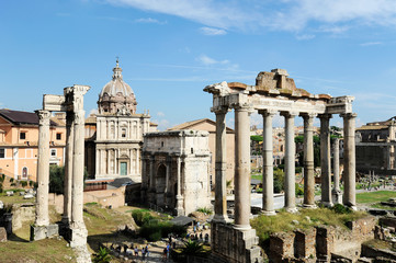 Obraz na płótnie Canvas Roman Forum in Rome, Italy, It is one of the main tourist attractions of Rome. Panorama of the famous Roman Forum or Foro Romano in a sunny day. Ancient architecture and cityscape of historical Rome.