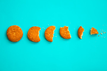 Biscuits on blue background. Top view.