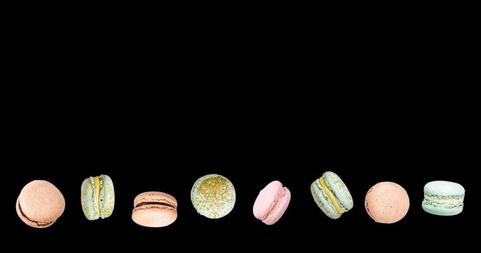 Macarons frame, fly falling macaroon. Alpha Channel
