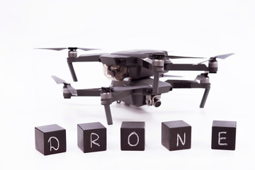 Flying drones lie on a white background. Theme selling and buying drone.