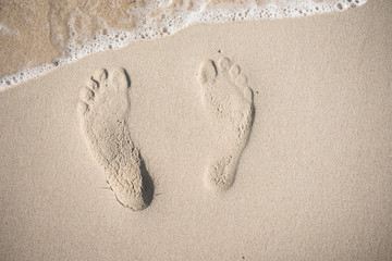 Fußabdrücke am Strand