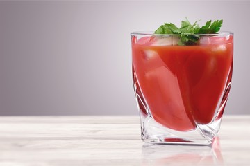 Glass of alcohol cocktail on white background, bloody Mary.