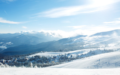 Obraz premium beautiful view of the mountains from a high point. Concept of travel, freedom, beauty of nature. beautiful day, sunny weather, blue sky.