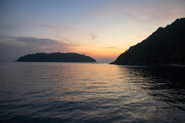beach with rocks and sky with effects of photography
