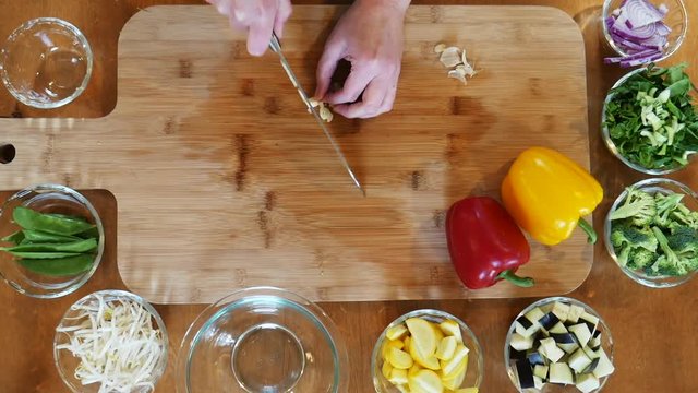 Close up, cutting garlic