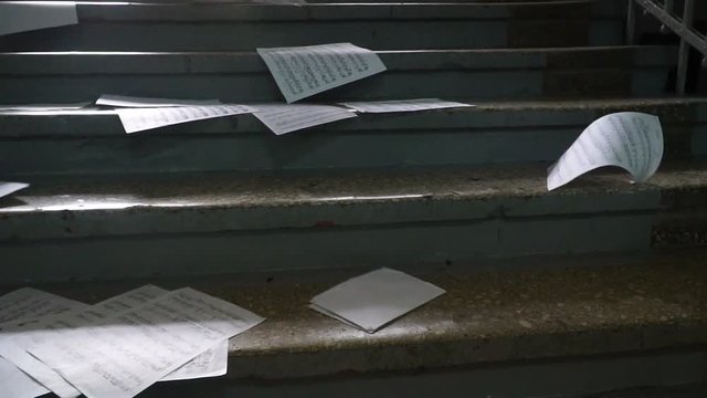 Musical notes. Paper falls to the floor