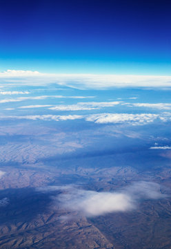 Fototapeta Clouds, a view from airplane window