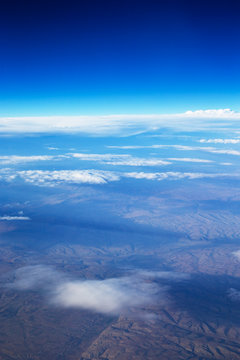 Fototapeta Clouds, a view from airplane window