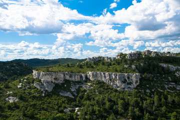 Fototapeta premium A view of the beautiful Alpilles countryside as seen from the Medieval ruins of the fortress of Les-Baux-De-Provence in France