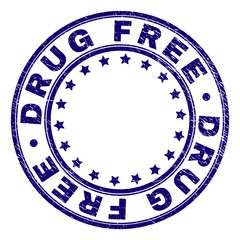 DRUG FREE stamp seal watermark with distress texture. Designed with circles and stars. Blue vector rubber print of DRUG FREE tag with retro texture.