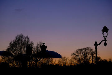 Sunset in Paris with old Lamp