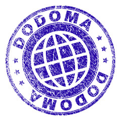 DODOMA stamp imprint with distress texture. Blue vector rubber seal imprint of DODOMA caption with dust texture. Seal has words placed by circle and planet symbol.