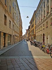 Italy, Mantua, locals in Fortunato Calvi medieval street. 