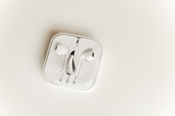 Hearing aid and earphone. The concept of hearing care.