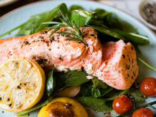 Grilled salmon filet with fresh greens