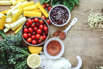 Fresh organic vegetables and ingredients prepared on a cutting board