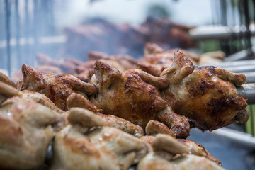 Grilled chicken is good food in Thailand. The big chicken is full of chicken. Then bring to the grill on the fire. The smoke is very pleasant to eat.